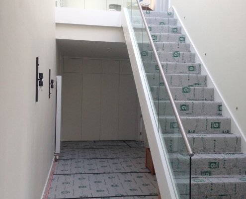 Stainless steel banister with glass balustrade